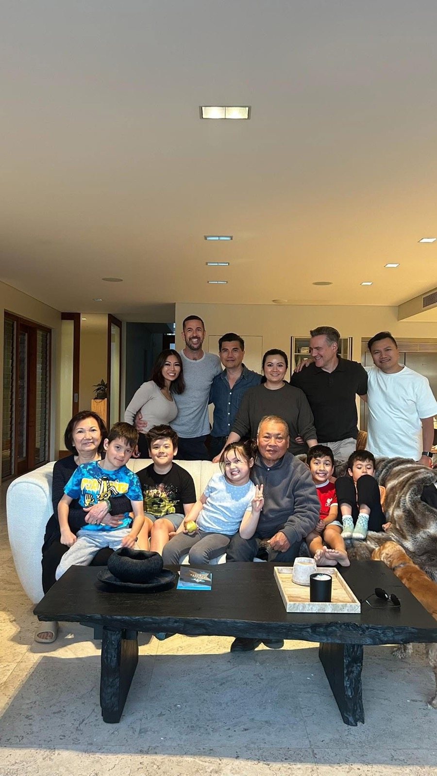 Julie Crawshay with her extended family gathered at home in Sydney, Australia